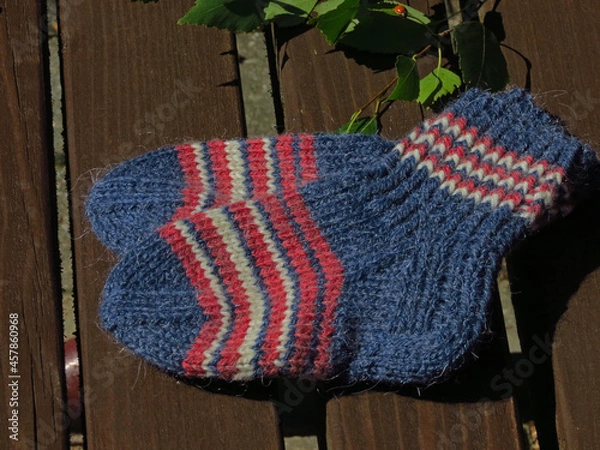 Obraz red knitted socks