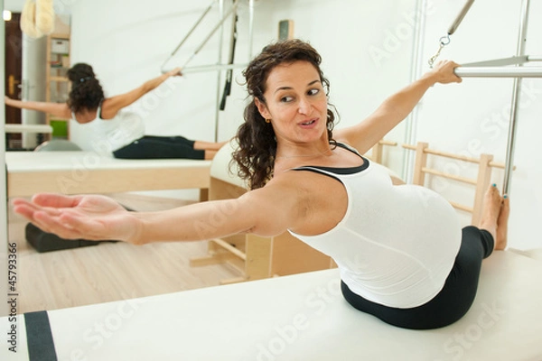 Obraz Pregnant lady doing pilates