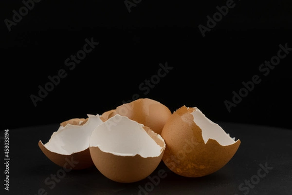 Fototapeta Broken of egg shell group crack  isolated on black background