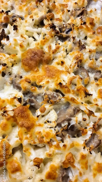 Obraz Cauliflower with mushrooms and cheese au gratin. Texture Food Background.