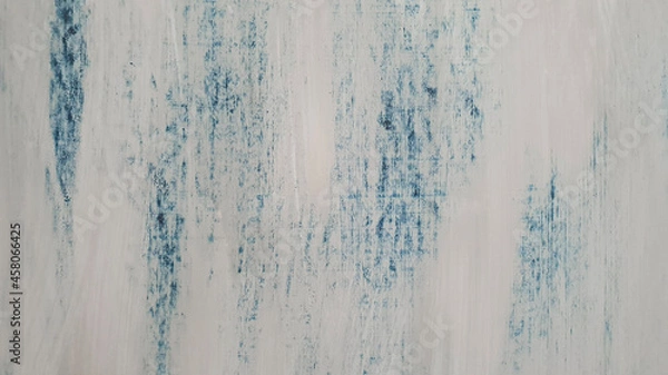 Obraz Photograph of a wooden door painted by hand with white and blue paint. Textured rustic paint creating a beautiful background.