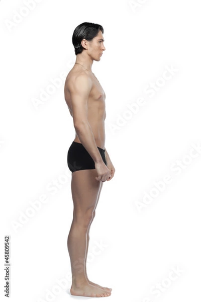 Obraz Спортивный мужчина во весь рост стоит в трусах