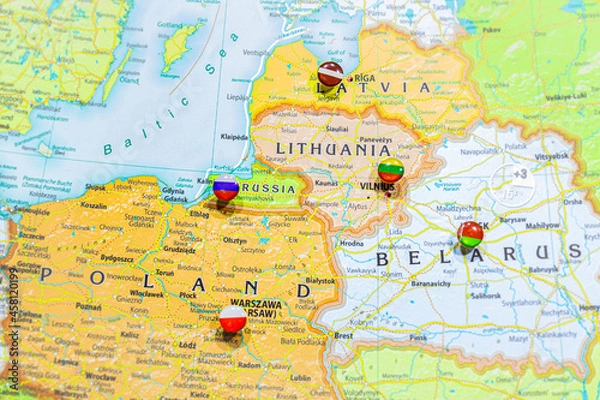Fototapeta Close-up view of Baltic States on a geographical globe, Map shows capitals countries Latvia -Riga, Lithuania - Vilnus, Estonia -Tallin Poland -Krakow and Kaliningrad region of Russia and their flags