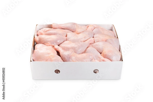 Obraz Fresh chicken leg with skin many pieces close-up in a cardboard box for a supermarket, retail. Raw chicken meat.
