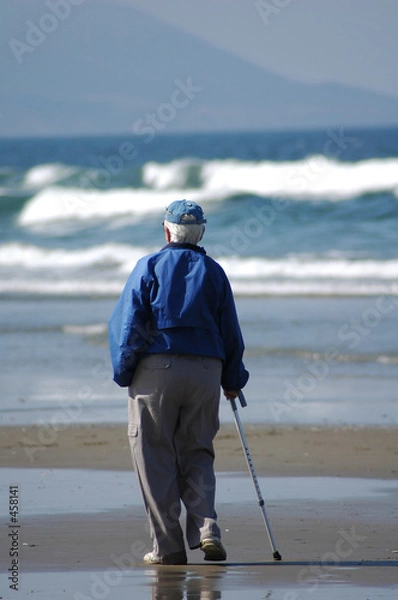 Obraz an old person on the beach