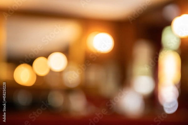 Fototapeta Defocused background with beautiful bokeh of elegant restaurant lounge.Beauty backgrounds