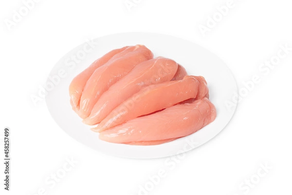Obraz Close-up of fresh chicken inner fillet on a white plate , background.Closeup of chicken meat.Healthy chicken mini inner breast fillets .