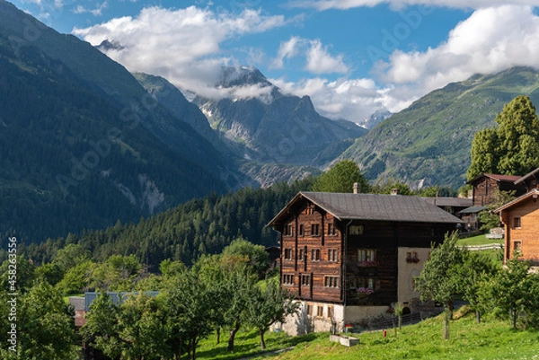 Fototapeta View of the village Ernen with Wannenhorn group in background