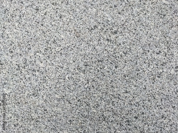 Obraz texture of a slab of gray granite stone. smooth grained stone texture