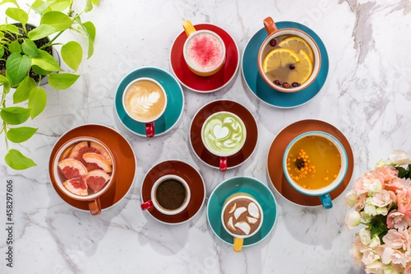 Obraz Different types of hot drinks coffee, matcha, cocoa and tea on marble background