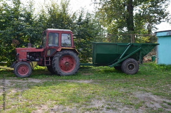 Fototapeta old tractor in the field