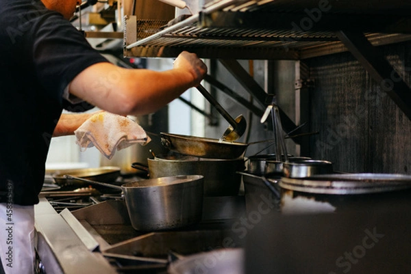 Fototapeta Chef cooking steak