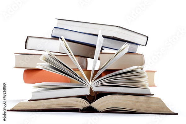 Fototapeta A stack of books on a white background.