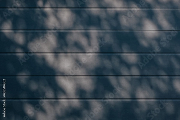 Obraz Shadow patterns on the wall. Background, texture.