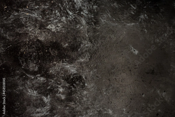 Fototapeta dark stone background with poorly spread cement texture