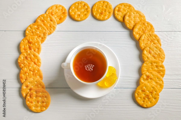 Fototapeta High resolution photo: Flatlay tea cup with crackers and some marmelade