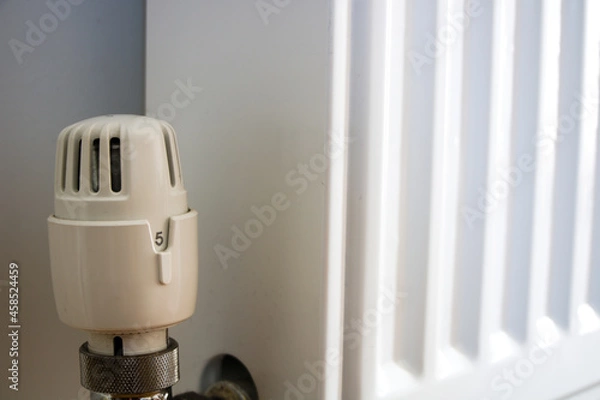 Obraz Thermostatic valve on radiator turned to highest number 5, close up