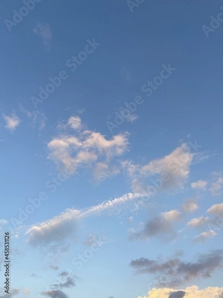 Fototapeta Blue Sky Background With White Clouds