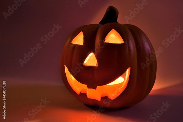 Fototapeta Clay pumpkin with tealight