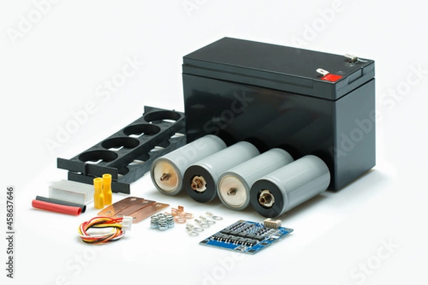 Obraz 12 Volt, Lithium Iron Phosphate Battery or LiFePO4 Rechargeable DIY kit for EV, eBikes, Outdoor Solar System with isolated on white background with clipping path, Selective focus.