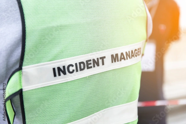 Obraz close up text incident manager on shirt