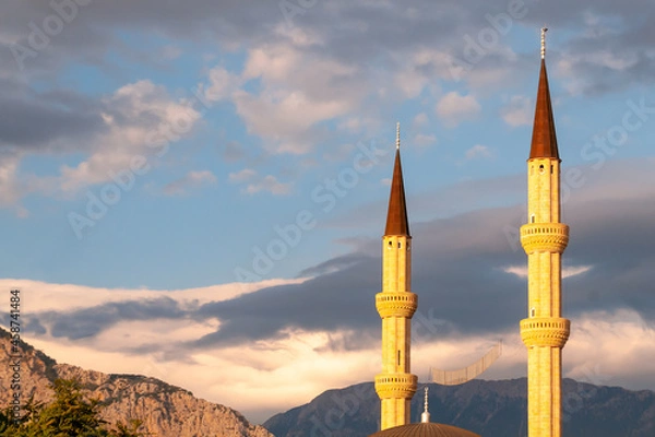 Fototapeta minaret tower in Antalya on a clear autumn day