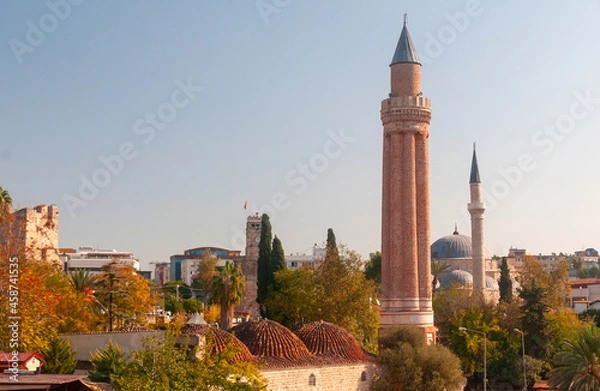 Fototapeta minaret tower in Antalya on a clear autumn day