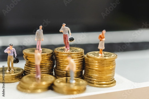 Fototapeta Gold coins stacks is representing riches and wealth management. Coin stack growing and find out the way to get a return on investment. Finance and money exchange investment as concept.