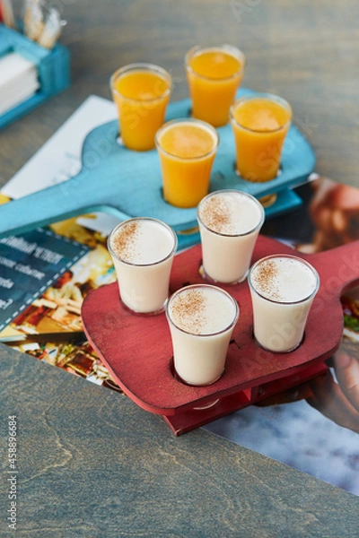 Obraz set of alcoholic sets on a wooden stand for the drinks menu of the restaurant or pub