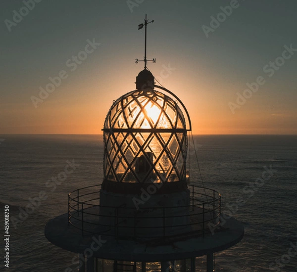 Obraz lighthouse at sunset