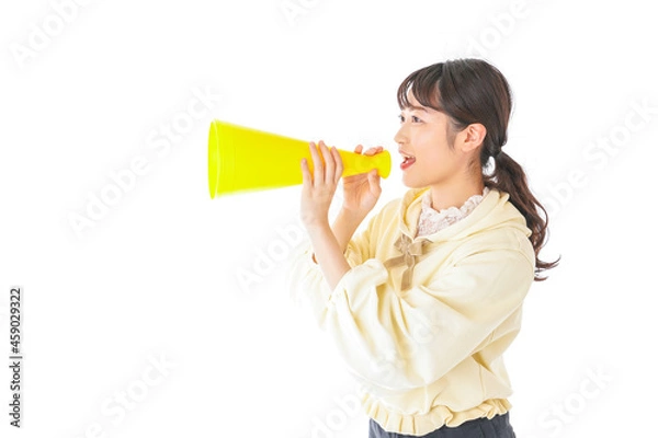 Fototapeta 応援をする若い女性