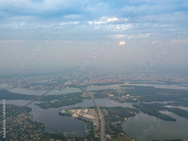 Obraz Sunset over Kiev. Cloudy evening. Aerial drone view.