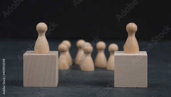 Fototapeta Two persons are standing in front of a crowd, candidates talking to the people