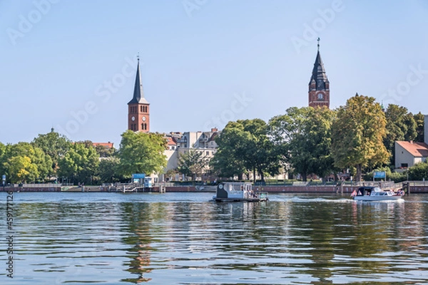 Fototapeta View over the river Dahme with pleasure boats at the old city of Koepenick in Berlin, Germany