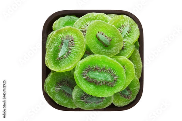 Fototapeta candied fruit, dried kiwi with sugar in square bowl isolated on white background. organic food, top view.