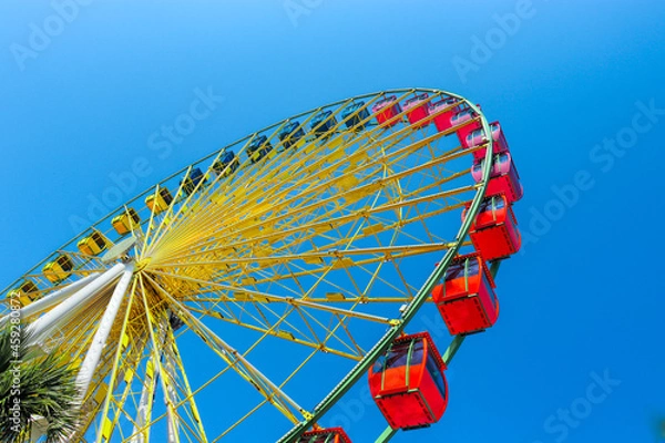 Fototapeta Multi color fly wheel on a sunny day, Myrtle Beach, SC