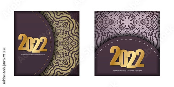 Fototapeta Postcard template 2022 Merry Christmas and Happy New Year burgundy color with winter gold pattern