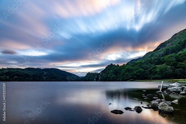 Fototapeta Llyn Gwynant is a lake in Snowdonia, Wales. The lake is natural, having been formed by glacial action and is 120 acres (50 hectares) in size. It is a popular place for canoeing and kayaking.