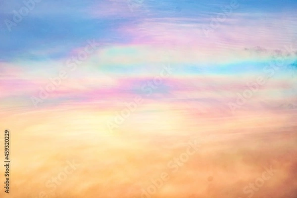 Fototapeta A rare case of Iridescent clouds showing dramatic color change in the sky
