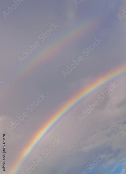 Fototapeta A double rainbow during sunset high resolution