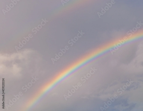 Fototapeta A double rainbow during sunset high resolution
