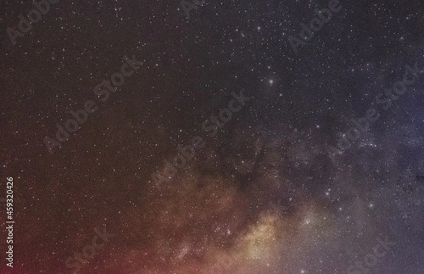 Fototapeta Negative effects of light pollution on visibility of the milkyway galaxy as seen in suburbs