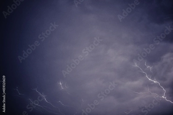 Fototapeta Lightning and thunder pictured during a rainstorm in deccan region of india monsoon season