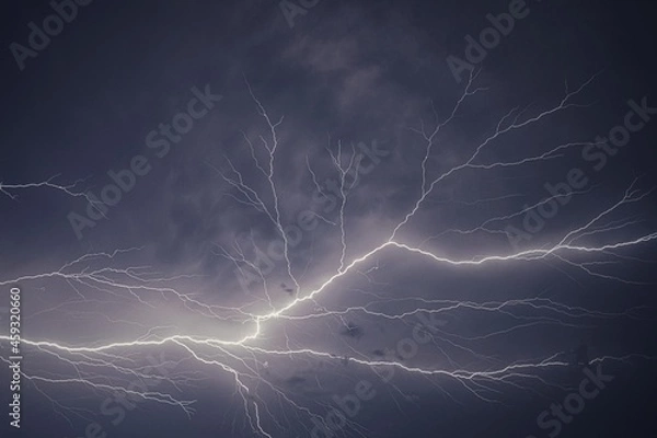 Fototapeta Lightning and thunder pictured during a rainstorm in deccan region of india monsoon season