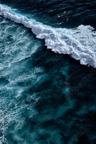 Fototapeta Aerial view to waves in ocean Splashing Waves. Blue clean wavy sea water.