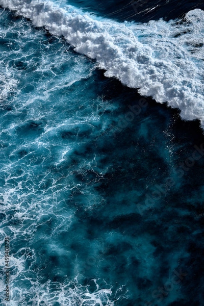 Fototapeta Aerial view to waves in ocean Splashing Waves. Blue clean wavy sea water.