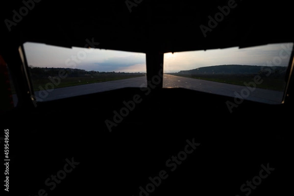Fototapeta View from the cockpit of the aircraft on the runway. High quality photo