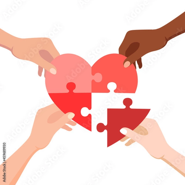 Fototapeta Hands connecting jigsaw puzzle in heart form. Concept of love, volunteering, charity and donation