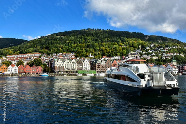 Fototapeta ship and typical old buildings in Bryggen district in Bergen, a beautiful city in Norway