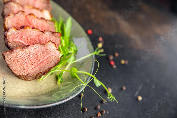 Fototapeta duck breast meat and garnish poultry second course fresh meal snack on the table copy space food background